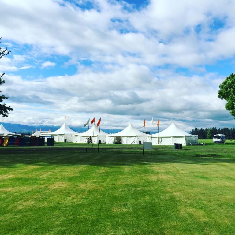 Marquee tents and blue skies.